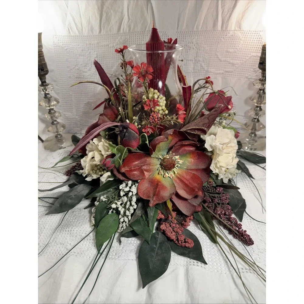 Artificial Fall Themed Floral Centerpiece Surrounding A Glass Vase